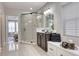 Bright bathroom featuring glass enclosed shower, vanity with granite countertop, and tile floors at 433 Cranleigh Se Rdg, Smyrna, GA 30080