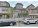 Charming townhome with well-maintained landscaping and convenient parking at 433 Cranleigh Se Rdg, Smyrna, GA 30080
