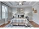 Comfortable main bedroom with tray ceiling, neutral decor, and large windows, creating a relaxing atmosphere at 433 Cranleigh Se Rdg, Smyrna, GA 30080
