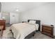 Spacious bedroom with a cozy queen bed, ample natural light, and modern furnishings at 7500 Gillespie Pl, Douglasville, GA 30135