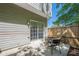 Fenced backyard with a patio area, fire pit, and sliding glass doors at 9155 Nesbit Ferry Rd # 65, Alpharetta, GA 30022