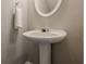 Bathroom features a pedestal sink at 9155 Nesbit Ferry Rd # 65, Alpharetta, GA 30022