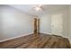 Spacious bedroom featuring LVP floors and closet at 9155 Nesbit Ferry Rd # 65, Alpharetta, GA 30022