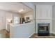 Modern kitchen with stainless steel appliances, breakfast bar, and open to the living area at 9155 Nesbit Ferry Rd # 65, Alpharetta, GA 30022