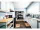 The kitchen features updated countertops, stainless steel appliances, and an eat-in dining area at 265 Winding Stream Trl, Hampton, GA 30228