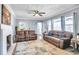 A well-lit living room featuring two plush couches and an open layout at 265 Winding Stream Trl, Hampton, GA 30228