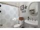 Cozy bathroom features decorative wall accents and a decorative shower curtain at 997 Woodbury Rd, Canton, GA 30114
