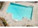 An in-ground swimming pool with multiple entry points and ladder exits for safety at 997 Woodbury Rd, Canton, GA 30114