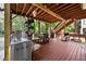 Covered deck with outdoor furniture and a staircase at 1721 Telfair Chase Way, Lawrenceville, GA 30043