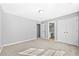 Large, neutral bedroom offering a closet and bathroom access, perfect for relaxation at 1721 Telfair Chase Way, Lawrenceville, GA 30043