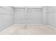 Walk-in closet with ample shelving and neutral carpeting, ready for organization at 1721 Telfair Chase Way, Lawrenceville, GA 30043