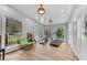 Bright exercise room with gym equipment and natural light and access to an outdoor balcony at 1721 Telfair Chase Way, Lawrenceville, GA 30043