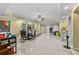 Bright living room with tile flooring, a ceiling fan, and many windows at 1721 Telfair Chase Way, Lawrenceville, GA 30043
