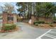 Brick condominium entrance with manicured landscaping and clear signage for a welcoming feel at 2112 Palmyra Dr, Marietta, GA 30067