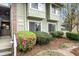 Inviting exterior of a two story building with well-maintained landscaping and blooming azaleas at 2112 Palmyra Dr, Marietta, GA 30067