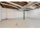 Spacious unfinished basement with exposed ductwork and utilities provides a blank canvas at 2184 Pemberton Sw Rd, Atlanta, GA 30331