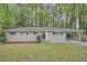 Charming single-story brick home with a carport and well-maintained front yard at 2184 Pemberton Sw Rd, Atlanta, GA 30331
