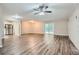 Open-concept living room with hardwood floors and lots of natural light at 2184 Pemberton Sw Rd, Atlanta, GA 30331