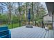 Back deck overlooking a large wooded lot with privacy fence and room to roam at 2772 Dunnington Cir, Atlanta, GA 30341