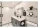 Bathroom with double sink vanity, frameless shower, and sleek fixtures at 2772 Dunnington Cir, Atlanta, GA 30341