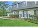 Welcoming home featuring a blue door, manicured landscaping, and well-maintained walkway leading to the entrance at 2772 Dunnington Cir, Atlanta, GA 30341