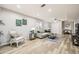 The open concept living room has modern finishes, recessed lights and vinyl flooring at 2772 Dunnington Cir, Atlanta, GA 30341