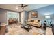 Comfortable living room with stylish decor, a ceiling fan, and hardwood floors at 2772 Dunnington Cir, Atlanta, GA 30341