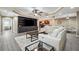 Large basement with a big tv, ping pong table and furniture at 6060 Masters Club Dr, Suwanee, GA 30024