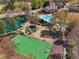 The community has a basketball court, playground, and lakefront area for recreation and leisure at 6060 Masters Club Dr, Suwanee, GA 30024