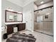 A spacious bathroom boasts a dual vanity, a large shower, and a soaking tub at 6060 Masters Club Dr, Suwanee, GA 30024