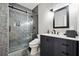 Contemporary bathroom featuring stylish glass shower, sleek vanity and marble accents at 6060 Masters Club Dr, Suwanee, GA 30024