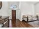 Elegant foyer with hardwood floors, high ceilings, and a beautiful arched window at 6060 Masters Club Dr, Suwanee, GA 30024
