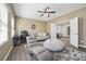 Comfortable living room with a sofa, bean bag, desk, and view to other rooms at 6060 Masters Club Dr, Suwanee, GA 30024