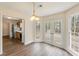 Bright breakfast nook with views of the deck and backyard at 9992 Neuchatel Cres, Jonesboro, GA 30238