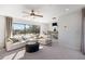 Relaxing living room with plush seating, a ceiling fan, and access to the outdoor patio at 1105 Rivard Nw Cir, Atlanta, GA 30318