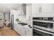 Well-appointed modern kitchen with stainless steel appliances and white cabinets at 1105 Rivard Nw Cir, Atlanta, GA 30318