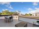 Rooftop patio with outdoor dining and seating, offering panoramic views of the surrounding area at 1105 Rivard Nw Cir, Atlanta, GA 30318