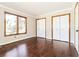 Bright bedroom with two closets, hardwood floors, and a window providing natural light at 1603 Circlestone Dr, Stone Mountain, GA 30088