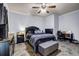 Bedroom features patterned tile floors, and a dark-colored furniture set at 1829 Appaloosa Mill Ct, Buford, GA 30519