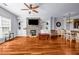 Spacious living room with fireplace, built-ins and dining area with great natural light at 1829 Appaloosa Mill Ct, Buford, GA 30519