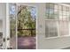 View of a wood balcony with access to a lush green outdoor space, providing a serene retreat at 2864 Parkway Close, Lithonia, GA 30058