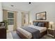 Serene bedroom with contemporary design elements, including a sleek wooden bed frame and soft, neutral tones at 2864 Parkway Close, Lithonia, GA 30058
