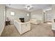 Spacious living room featuring a cozy fireplace and seamlessly integrated flooring at 1408 Seals Rd, Dallas, GA 30157