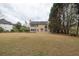 Expansive backyard view showcasing the home's rear exterior at 2555 Stonevalley Ln, Cumming, GA 30041