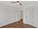 Bedroom features wood floors and closet at 2555 Stonevalley Ln, Cumming, GA 30041
