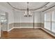 Elegant dining room with hardwood floors and a stylish chandelier at 2555 Stonevalley Ln, Cumming, GA 30041