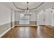 Open dining room featuring beautiful hardwood floors and natural light at 2555 Stonevalley Ln, Cumming, GA 30041