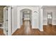 Inviting foyer with hardwood floors and an arched doorway at 2555 Stonevalley Ln, Cumming, GA 30041