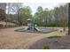 Community playground with slides and swings for children to enjoy at 2555 Stonevalley Ln, Cumming, GA 30041