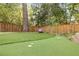 Backyard featuring manicured lawn and a putting green at 2877 Elliott Ne Cir, Atlanta, GA 30305